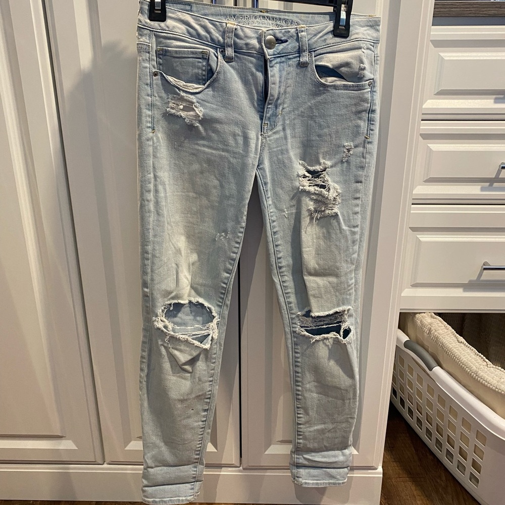 American Eagle light washed ripped skinny jeans